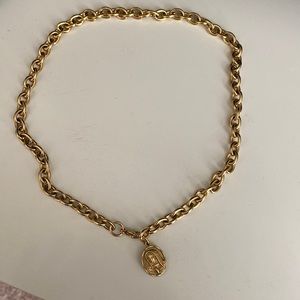 Gold saint necklace